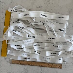 CHANEL White Ribbon with Black Text